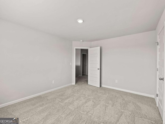 2027 Massey Ln, Winder, GA 30680 - unfurnished bedroom featuring carpet and baseboards