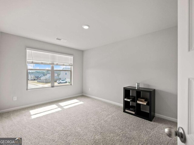 2027 Massey Ln, Winder, GA 30680 - spare room featuring visible vents, baseboards, and carpet