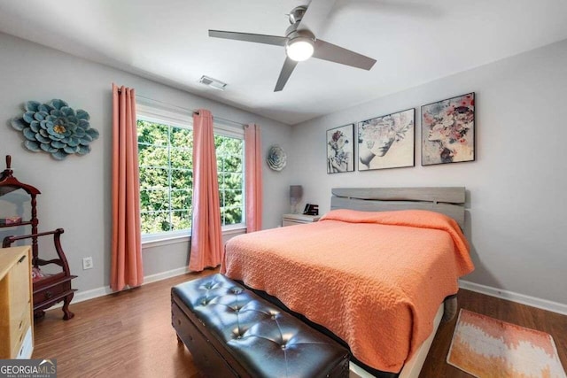 3015 Gold Creek Dr, Villa Rica, GA 30180 - bedroom with wood finished floors and ceiling fan