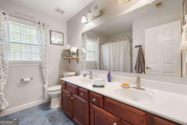 3015 Gold Creek Dr, Villa Rica, GA 30180 - full bath with double vanity, tile patterned flooring, and a shower with curtain