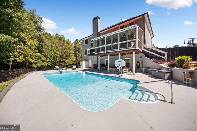 3015 Gold Creek Dr, Villa Rica, GA 30180 - view of pool featuring a patio area and a sunroom