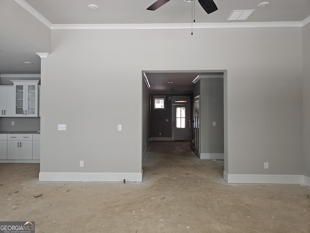 6841 Phillips Mill Rd, Douglasville, GA 30135 - unfurnished room featuring crown molding, baseboards, a ceiling fan, and unfinished concrete floors