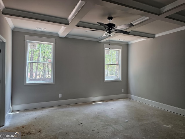 6841 Phillips Mill Rd, Douglasville, GA 30135 - empty room with coffered ceiling, plenty of natural light, baseboards, ceiling fan, and beamed ceiling