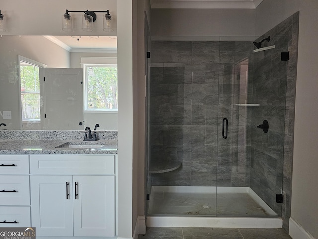 6841 Phillips Mill Rd, Douglasville, GA 30135 - full bathroom with crown molding, a shower stall, plenty of natural light, and vanity
