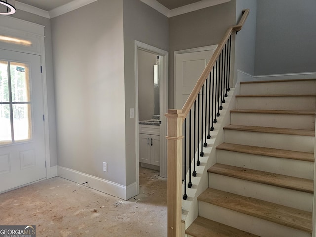 6841 Phillips Mill Rd, Douglasville, GA 30135 - entrance foyer with stairway, ornamental molding, and baseboards