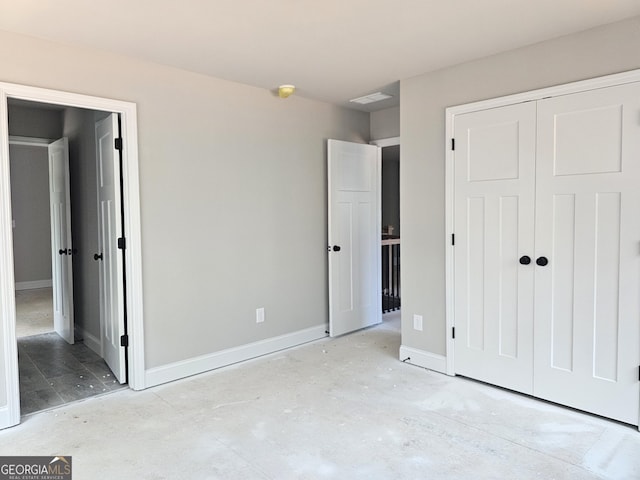 6841 Phillips Mill Rd, Douglasville, GA 30135 - unfurnished bedroom with baseboards and a closet