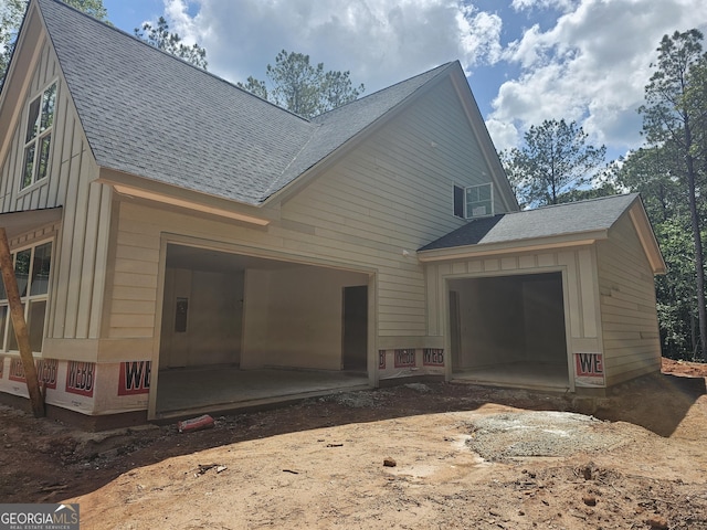 6841 Phillips Mill Rd, Douglasville, GA 30135 - view of side of home with roof with shingles and a garage
