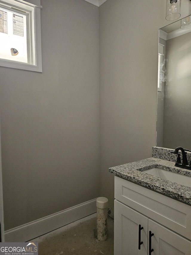 6841 Phillips Mill Rd, Douglasville, GA 30135 - bathroom featuring vanity and baseboards