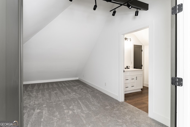 6592 Factory Shoals Rd SW, Mableton, GA 30126 - bonus room with dark carpet, lofted ceiling, baseboards, and a sink
