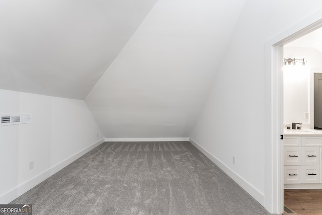 6592 Factory Shoals Rd SW, Mableton, GA 30126 - bonus room with vaulted ceiling, a sink, carpet floors, and baseboards