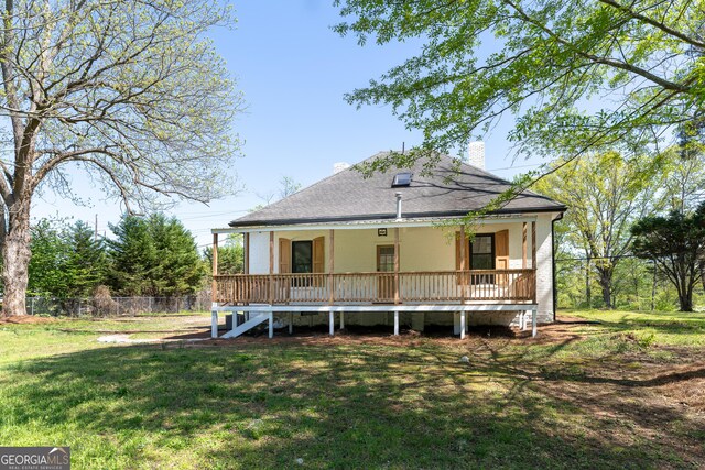 6592 Factory Shoals Rd SW, Mableton, GA 30126 - rear view of house with a chimney and roof with shingles