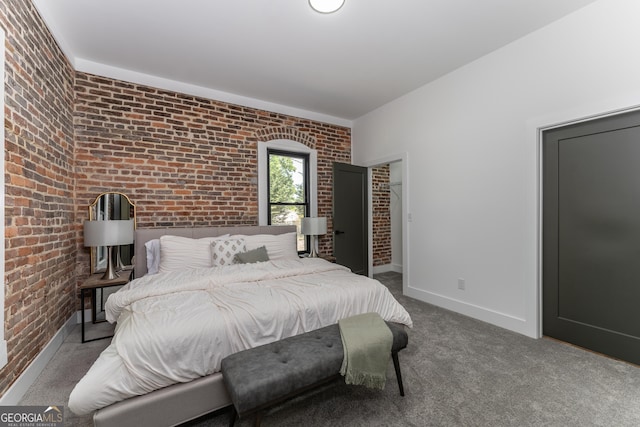 6592 Factory Shoals Rd SW, Mableton, GA 30126 - bedroom with brick wall, carpet floors, and baseboards