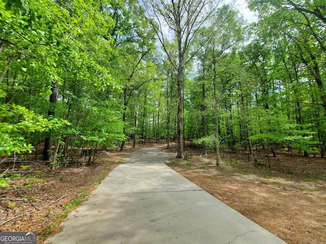 view of home's community with a view of trees