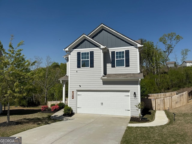 view of front of house featuring concrete driveway, a garage, and board and batten siding