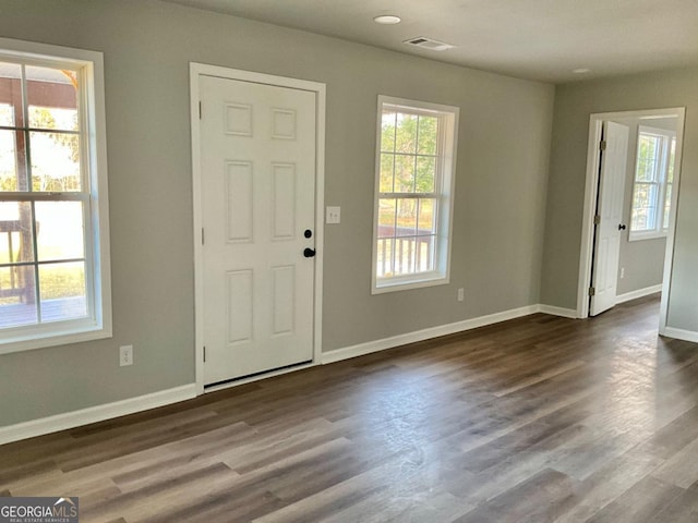 1350 Dogwood Rd, Woodville, GA 30669 - entryway featuring baseboards, visible vents, and dark wood-style flooring