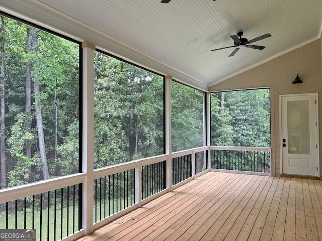 7 Fontaine Dr, Newnan, GA 30263 - unfurnished sunroom with ceiling fan and vaulted ceiling
