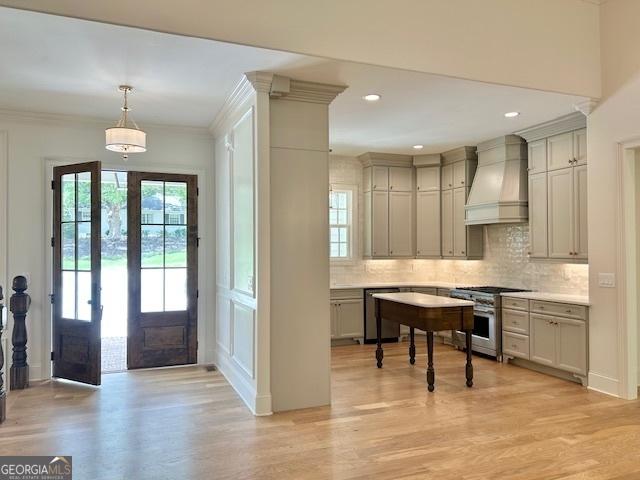 7 Fontaine Dr, Newnan, GA 30263 - entrance foyer with plenty of natural light, french doors, light wood-style flooring, crown molding, and recessed lighting