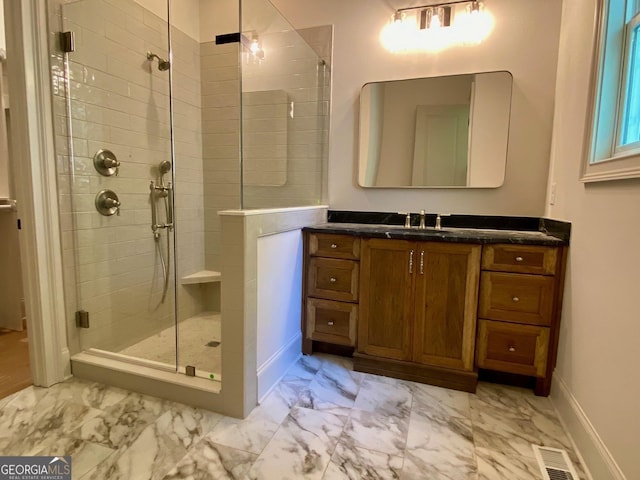 7 Fontaine Dr, Newnan, GA 30263 - full bath with marble look tile flooring, a shower stall, baseboards, and vanity