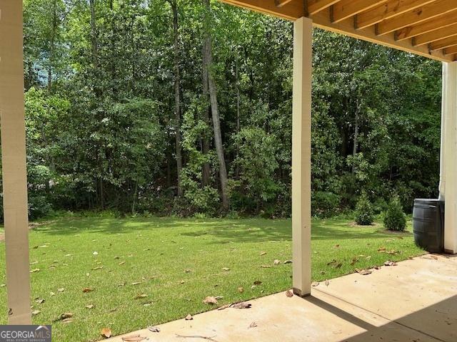 7 Fontaine Dr, Newnan, GA 30263 - view of green lawn featuring a patio area