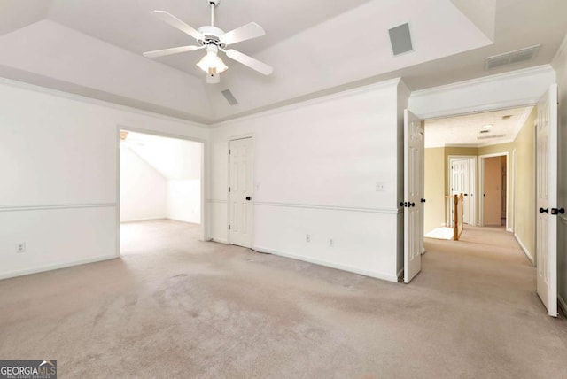 2002 Stonewick Ct, Lawrenceville, GA 30043 - unfurnished bedroom featuring light colored carpet, ornamental molding, lofted ceiling, and a ceiling fan