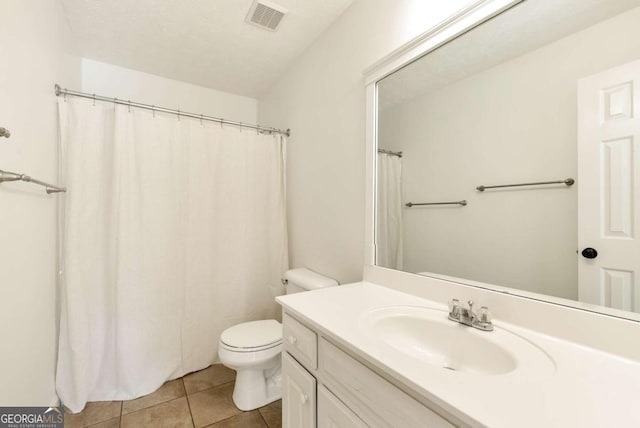 2002 Stonewick Ct, Lawrenceville, GA 30043 - bathroom with vanity and tile patterned floors