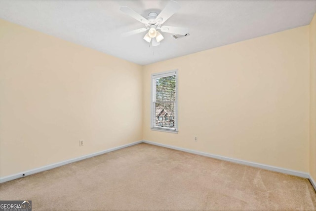 2002 Stonewick Ct, Lawrenceville, GA 30043 - spare room featuring light colored carpet and ceiling fan