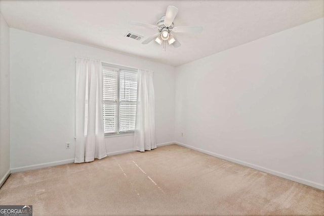2002 Stonewick Ct, Lawrenceville, GA 30043 - carpeted spare room with baseboards and a ceiling fan
