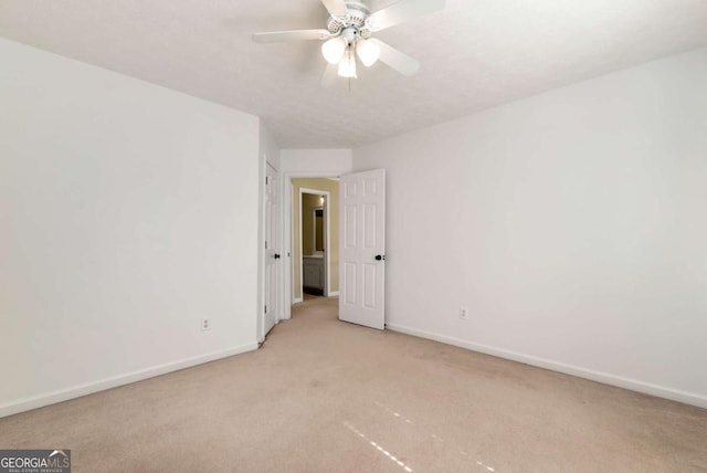 2002 Stonewick Ct, Lawrenceville, GA 30043 - spare room with light colored carpet and a ceiling fan