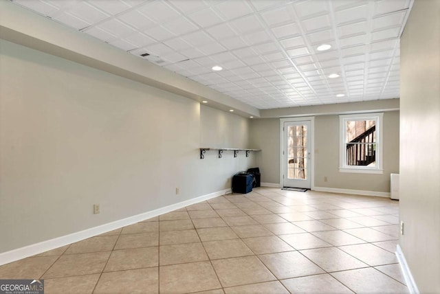 2002 Stonewick Ct, Lawrenceville, GA 30043 - unfurnished living room with recessed lighting and light tile patterned floors