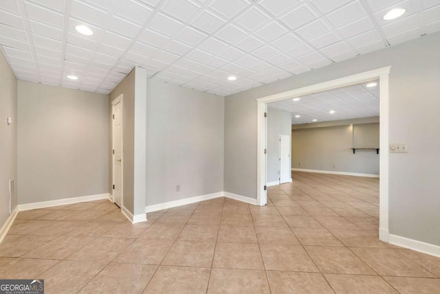 2002 Stonewick Ct, Lawrenceville, GA 30043 - spare room with recessed lighting and light tile patterned floors