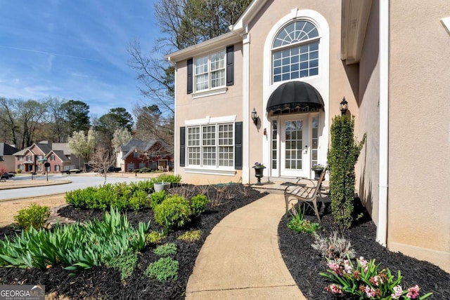 2002 Stonewick Ct, Lawrenceville, GA 30043 - entrance to property with stucco siding and a residential view