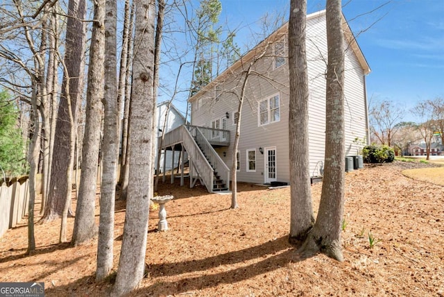 2002 Stonewick Ct, Lawrenceville, GA 30043 - back of property featuring stairway and a deck