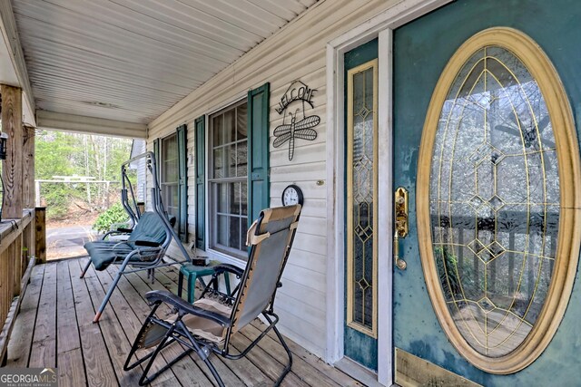 1327 Pinnacle Dr, Clayton, GA 30525 - wooden terrace featuring covered porch