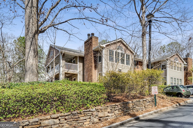 exterior space featuring a chimney
