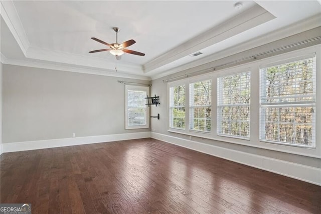 bathroom featuring marble look tile flooring, lofted ceiling, healthy amount of natural light, and a soaking tub