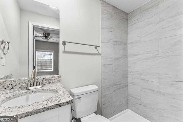 109 White Ave, Hogansville, GA 30230 - full bath with toilet, ceiling fan, vanity, and a tile shower