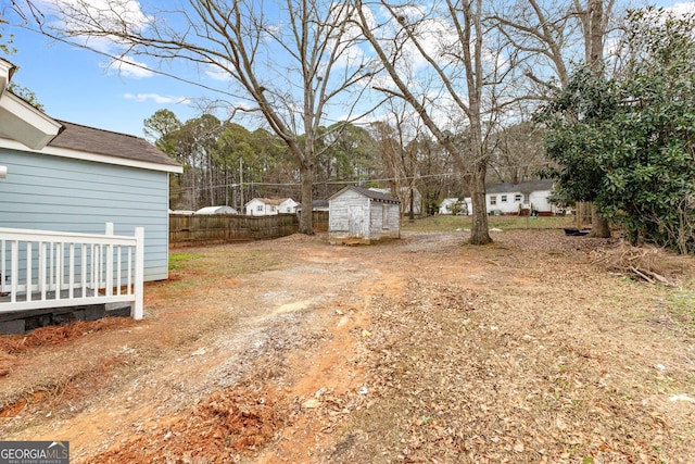 109 White Ave, Hogansville, GA 30230 - view of yard with a storage shed, an outdoor structure, and fence