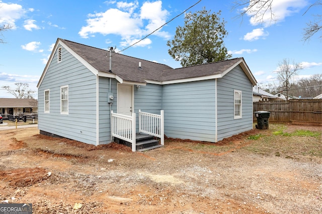 109 White Ave, Hogansville, GA 30230 - back of house with roof with shingles and fence