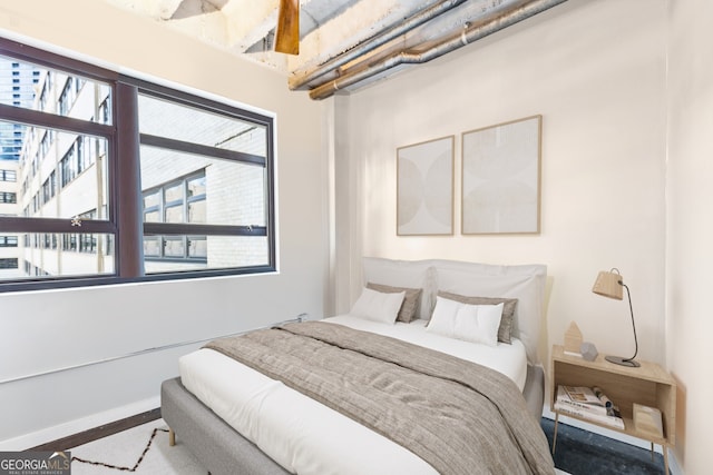 bedroom featuring baseboards