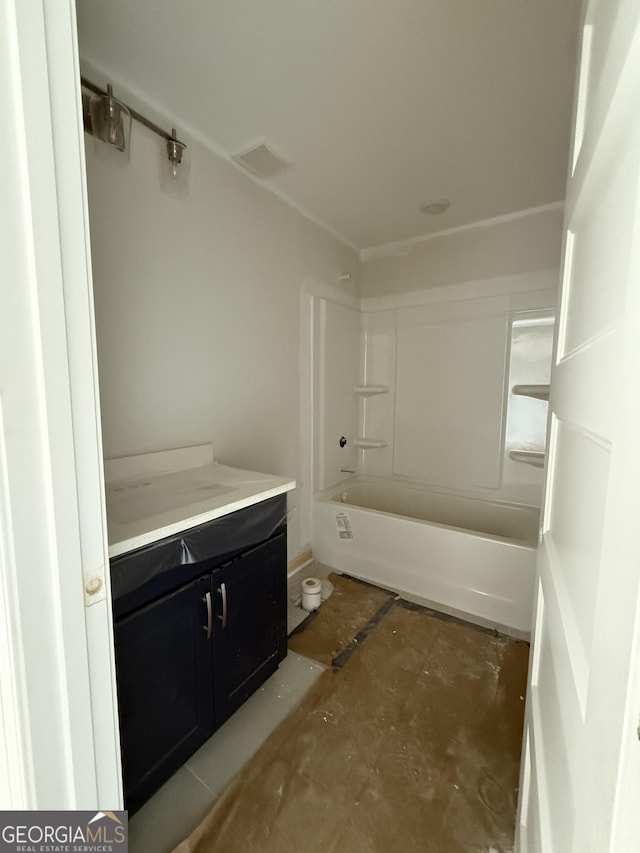full bath with vanity, toilet, and shower / washtub combination
