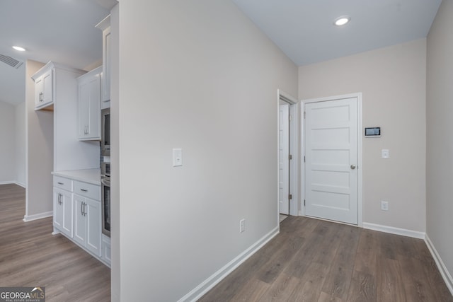 561 Jugtown Rd, Meansville, GA 30256 - hallway featuring wood finished floors, baseboards, and recessed lighting