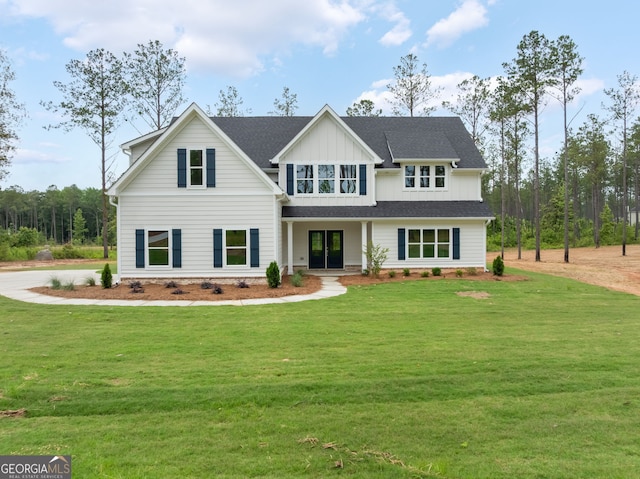 561 Jugtown Rd, Meansville, GA 30256 - view of front of house with a front yard and board and batten siding