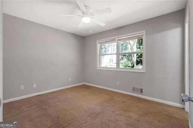 2522 Brentwood Ct, Decatur, GA 30032 - carpeted spare room with visible vents, baseboards, and ceiling fan