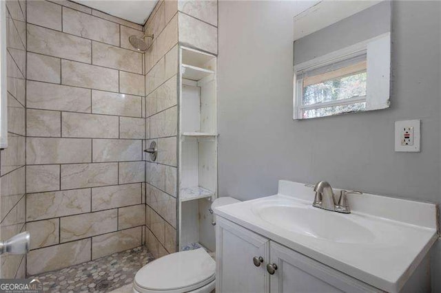 2522 Brentwood Ct, Decatur, GA 30032 - bathroom featuring toilet, vanity, and a tile shower