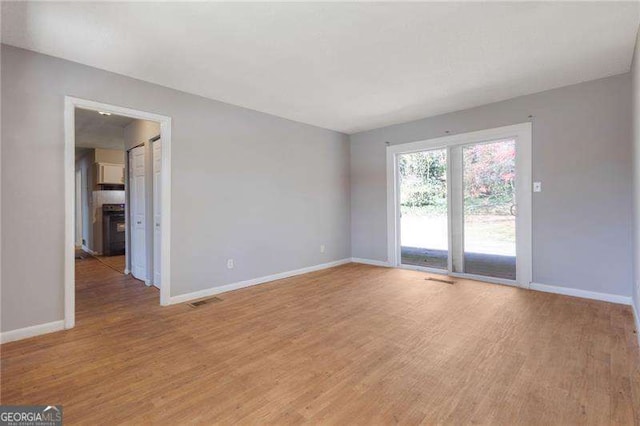 2522 Brentwood Ct, Decatur, GA 30032 - spare room featuring visible vents, light wood-style flooring, and baseboards