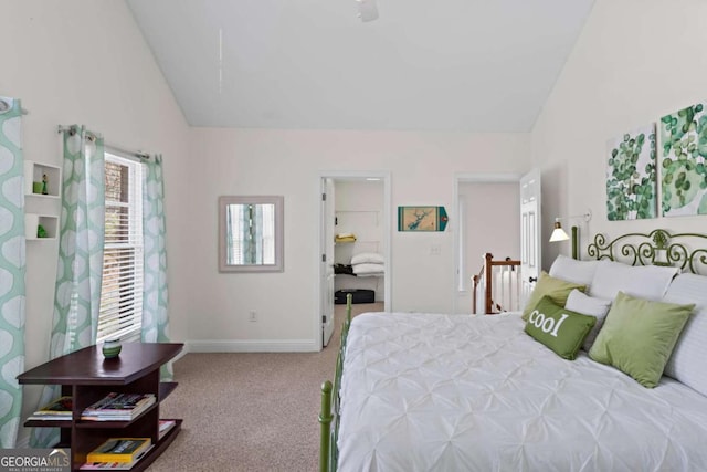 carpeted bedroom featuring baseboards, high vaulted ceiling, and a ceiling fan