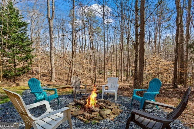 view of patio / terrace with an outdoor fire pit