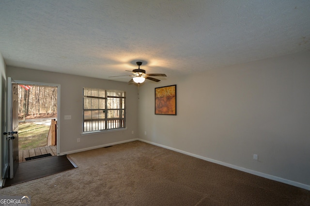 98 Brenda Cir, Rockmart, GA 30153 - carpeted empty room featuring baseboards, a textured ceiling, and ceiling fan