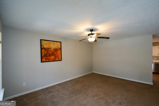 98 Brenda Cir, Rockmart, GA 30153 - unfurnished room featuring a textured ceiling, a ceiling fan, dark colored carpet, and baseboards