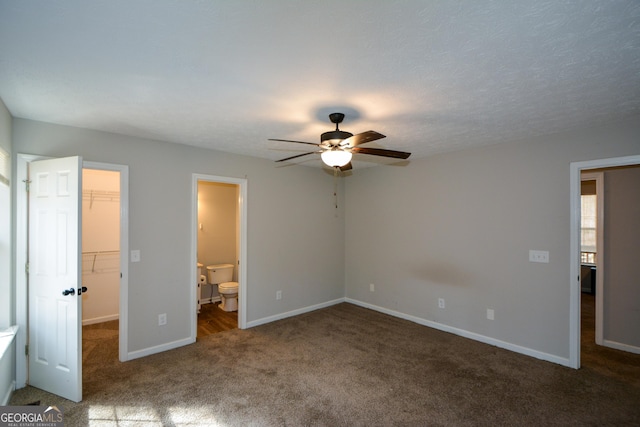 98 Brenda Cir, Rockmart, GA 30153 - unfurnished bedroom with ensuite bathroom, a closet, carpet flooring, baseboards, and a spacious closet